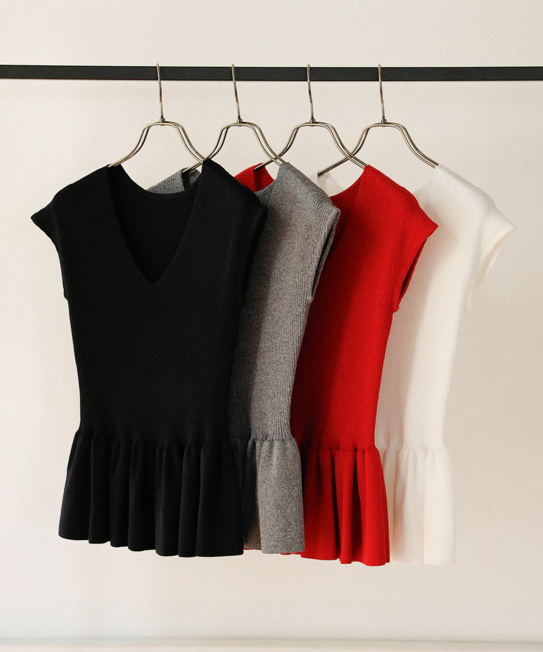 Clear Peplum V/N Tops