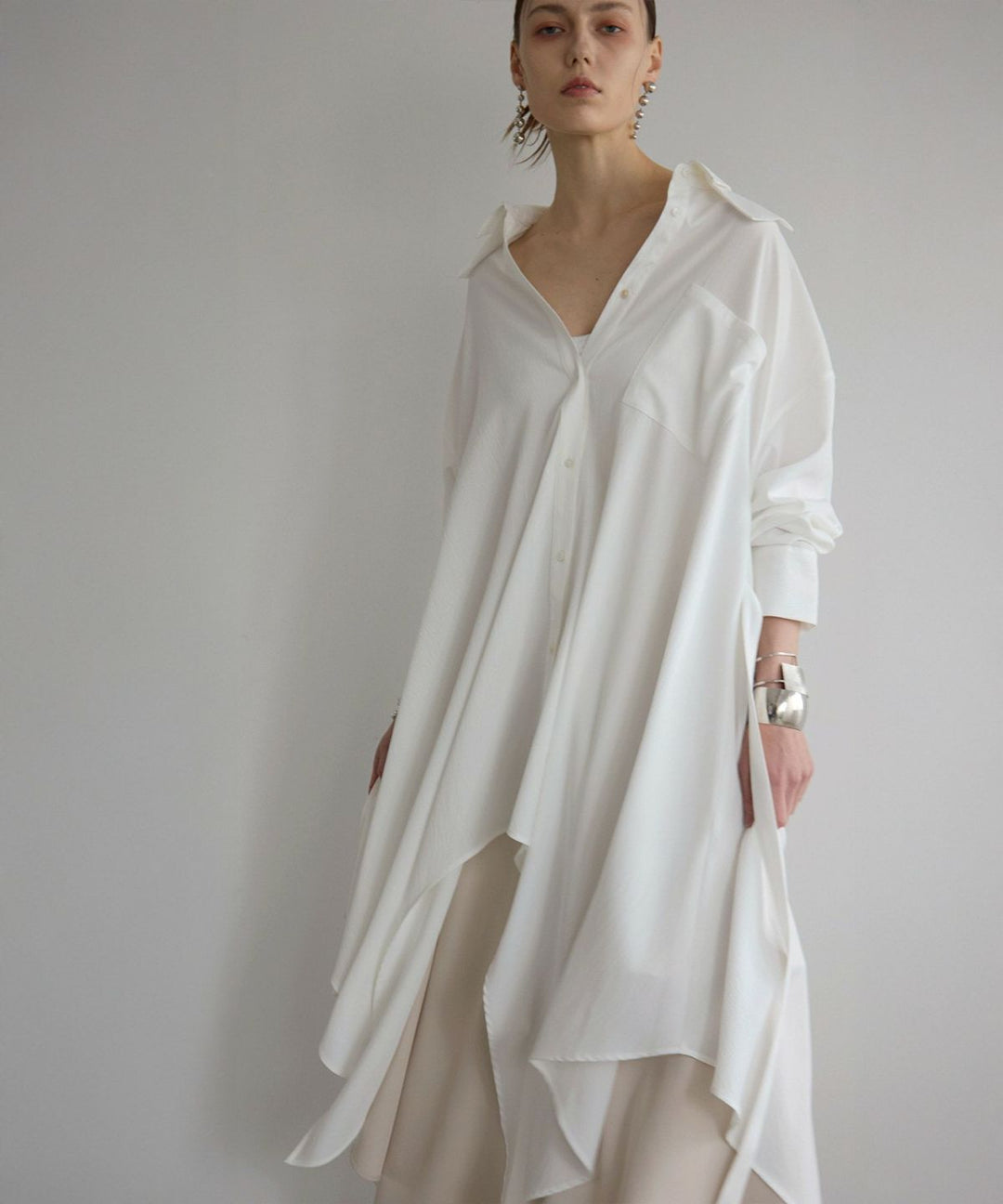 Bumpy Irregular Hem Shirt